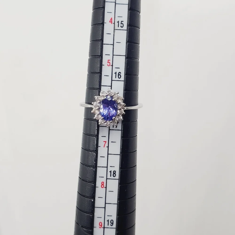 10k Solid White Gold Oval Tanzanite & Round White Topaz Halo Ring